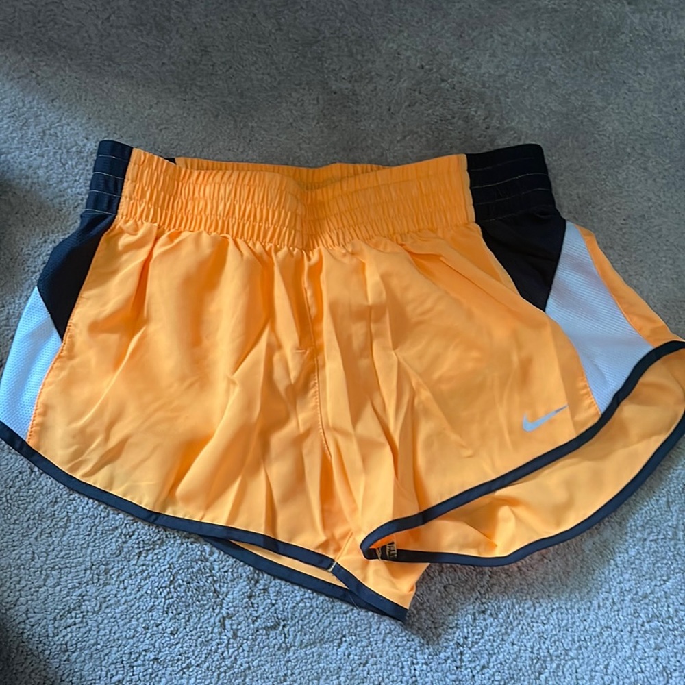 Nike dri fit shorts size small. Neon orange